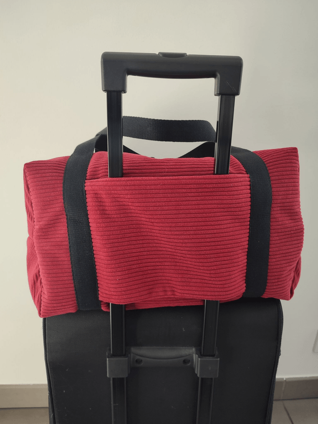 Sac de voyage rouge framboise 